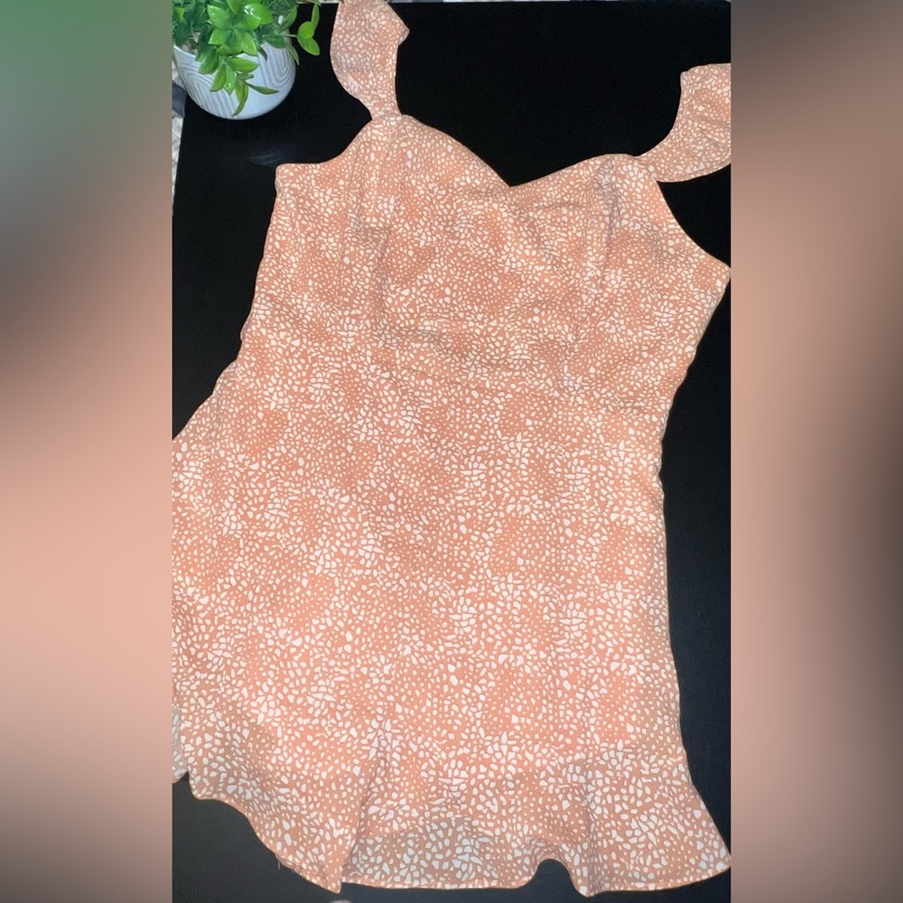 Like New She & Sky Peach Color ruffled hem Romper Size L